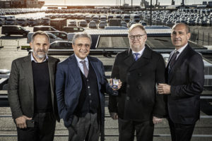 A medal presentation ceremony celebrating 25 years of collaboration between Niels Winther Liner Agencies and Grimaldi Lines. Pictured left to right: Mario Massarotti (SAL Board Member), Baldissara Costantino (SAL Chairman), Henrik Otto Jensen (Co-owner and CEO of SAL, owner of Niels Winther & Co.), and Gianpaolo Polichetti (SAL Board Member).
