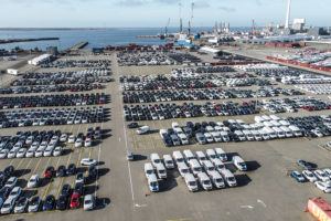 A panoramic view of the car terminal, showcasing systematically lined-up cars awaiting transportation for Pre-Delivery Inspection at Multiterminal.