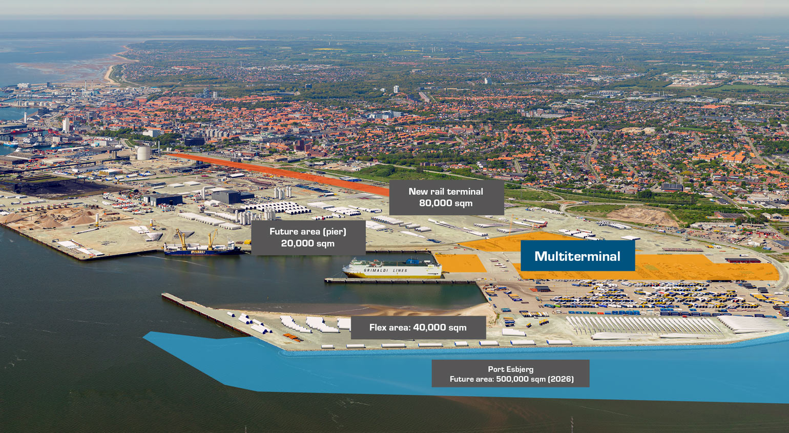 Aerial view of the expansive Multiterminal spanning 150,000 sqm, featuring a sea terminal with vessels up to 225m x 36m x 12.5m, rail connectivity within the port area, and direct road access to the motorway. The multiterminal boasts storage facilities, 24/7 stevedoring services, and a well-equipped container terminal. Offering dedicated port agency services, customs clearance, and a comprehensive range of logistics solutions for various cargo types, including Breakbulk, RoRo, Auto Hub, Containers, and more. Multiterminal serves as your maritime gateway to the world, ensuring excellence, convenience, and efficiency in cargo handling and transportation.